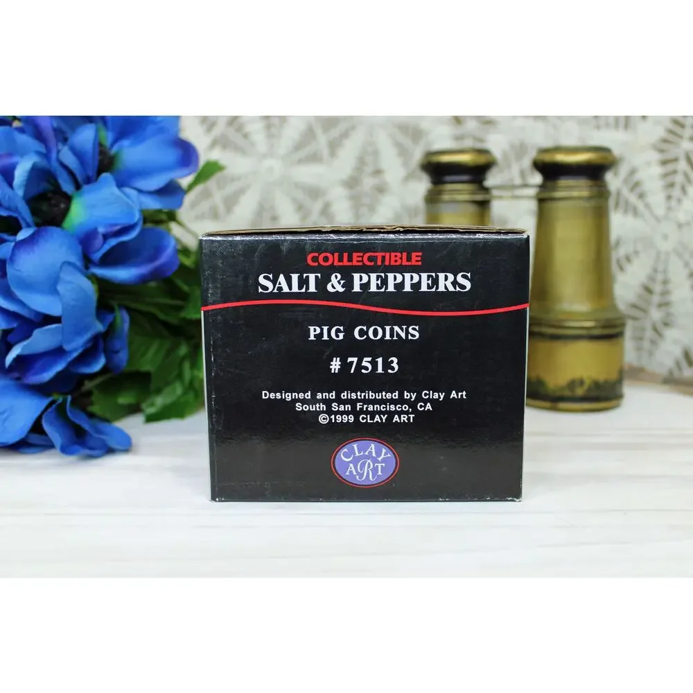 1999 Clay Art Pig Coins Salt and Pepper shakers.